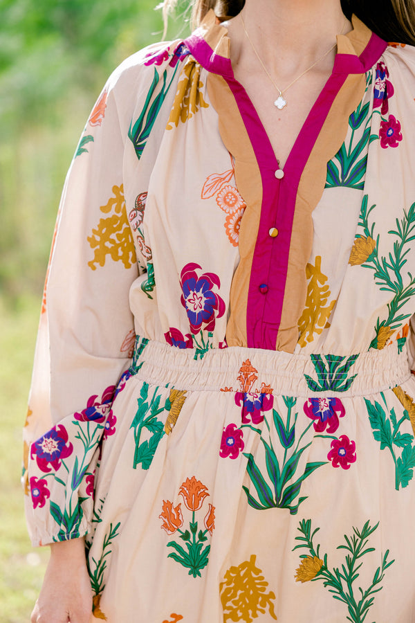 Chic Soul plus size clothing, tan long sleeve midi dress with multi color floral print, buttons going down the chest and a neckline with a collar that is magenta