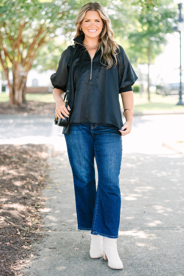 Plus Size black satin-finish top with a half-zip neckline, high collar, and short puff sleeves.