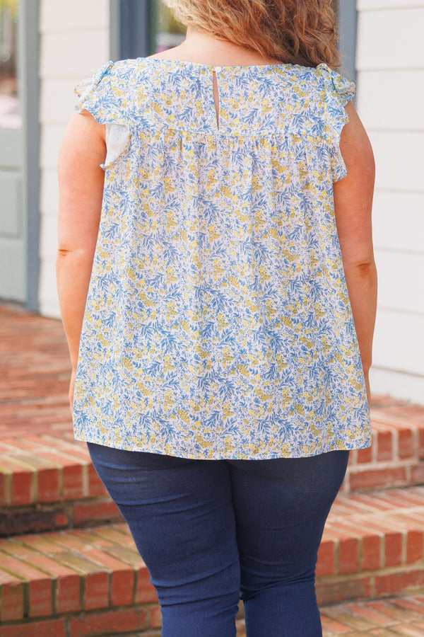 Chic Soul plus size clothing, blue and green floral pattern top with flutter sleeves
