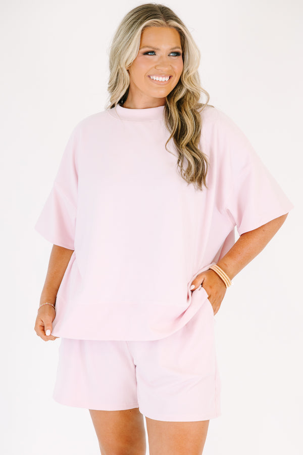 Plus Size pink two-piece lounge set with a short-sleeve ribbed top and matching pull-on shorts.