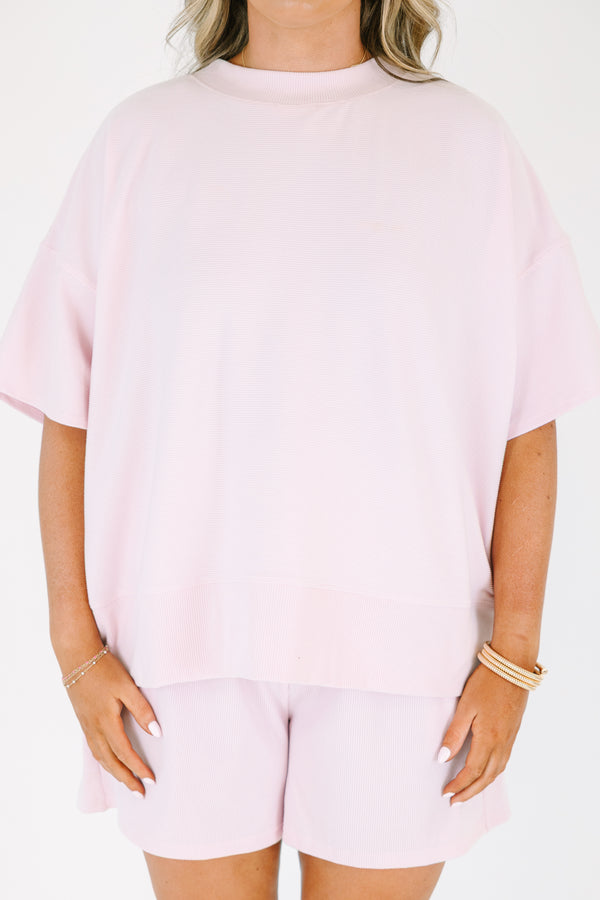 Plus Size pink two-piece lounge set with a short-sleeve ribbed top and matching pull-on shorts.