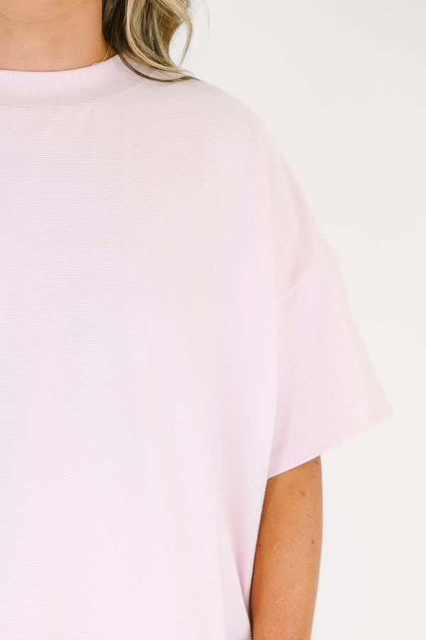 Plus Size pink two-piece lounge set with a short-sleeve ribbed top and matching pull-on shorts.