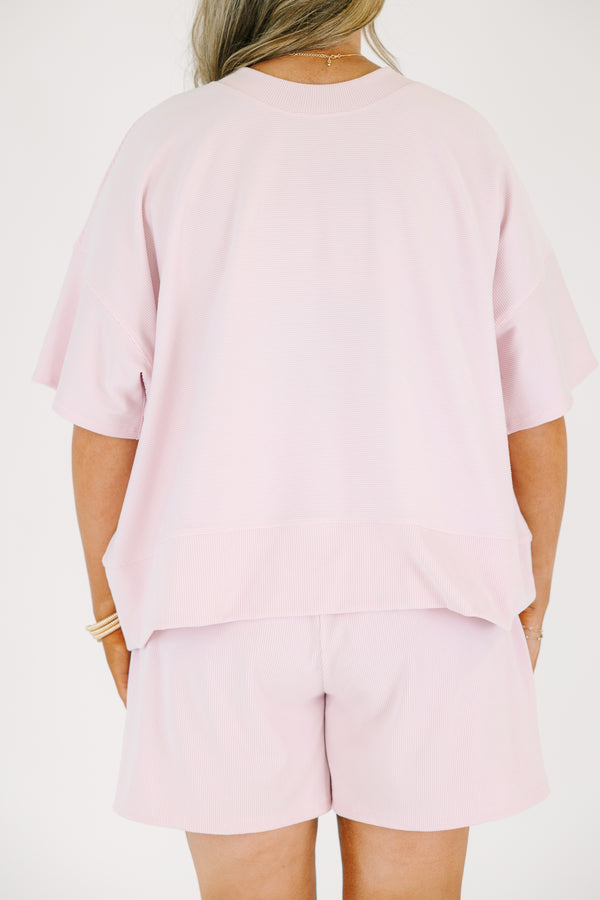 Plus Size pink two-piece lounge set with a short-sleeve ribbed top and matching pull-on shorts.