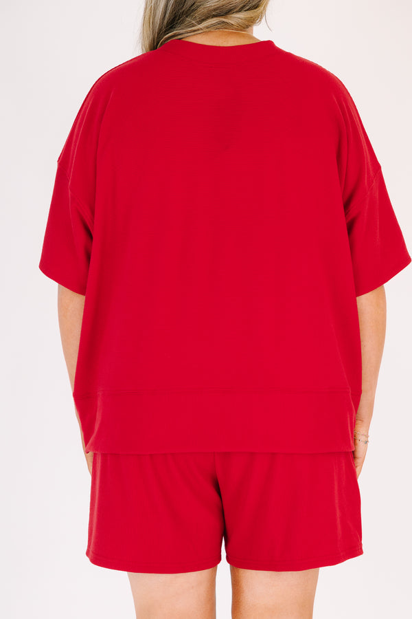 Plus Size red two-piece set with a short-sleeve ribbed top and matching elastic waistline shorts.