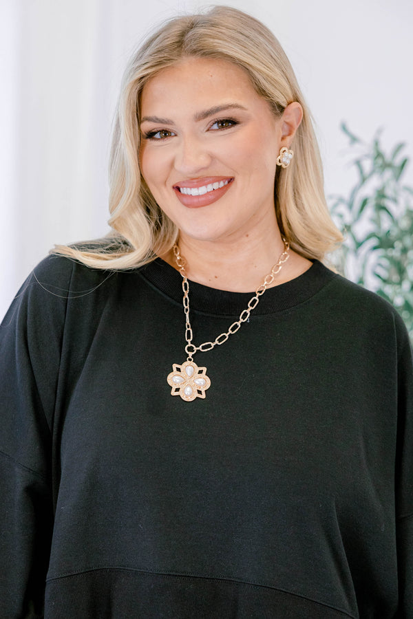 Chic Soul plus size necklace, gold clover pendent necklace with pearl details that is attached to a gold link chain 