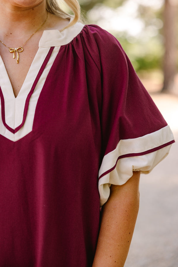 Chic Soul plus size clothing, wine red short puff sleeve maxi dress with white trim around the sleeves, hem, and v neckline