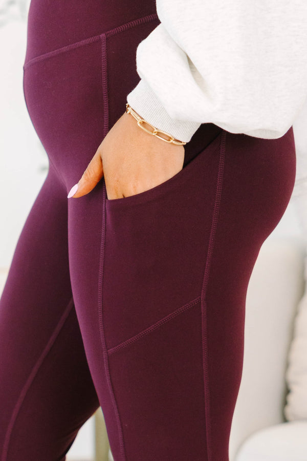 Plus Size high-waisted, full-length leggings in cassis with side pockets and a buttery-soft finish.
