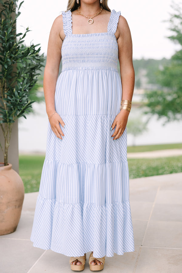 Plus Size blue and white striped maxi dress with a smocked bodice and tiered skirt.