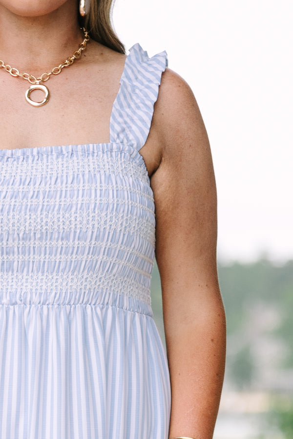 Plus Size blue and white striped maxi dress with a smocked bodice and tiered skirt.