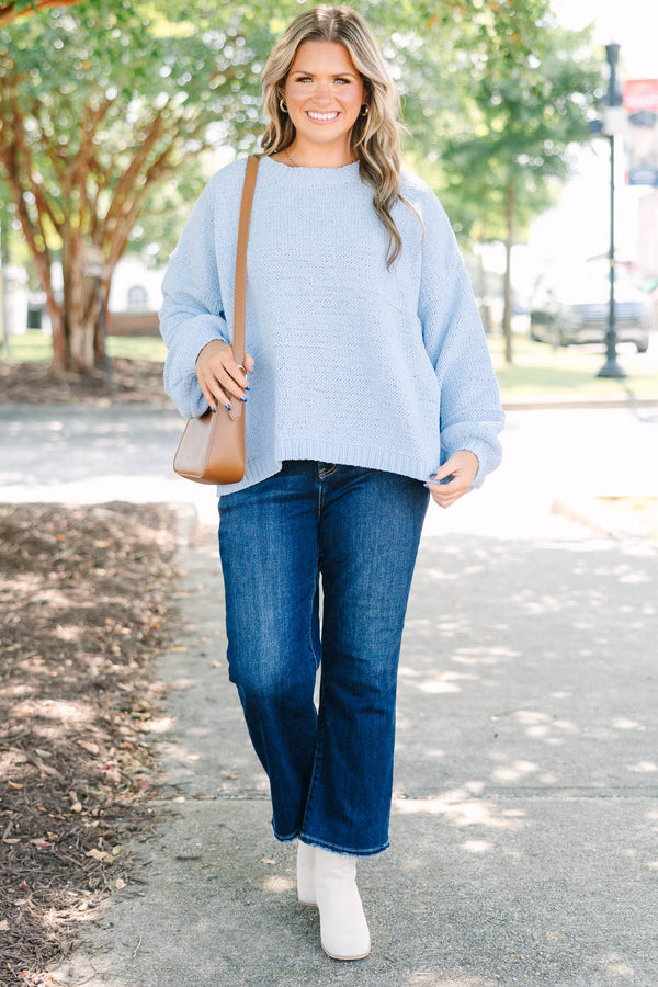 Plus Size light blue oversized knit sweater with a crew neckline and long balloon sleeves.