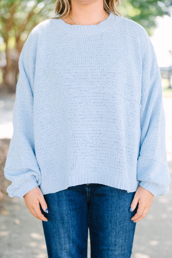 Plus Size light blue oversized knit sweater with a crew neckline and long balloon sleeves.