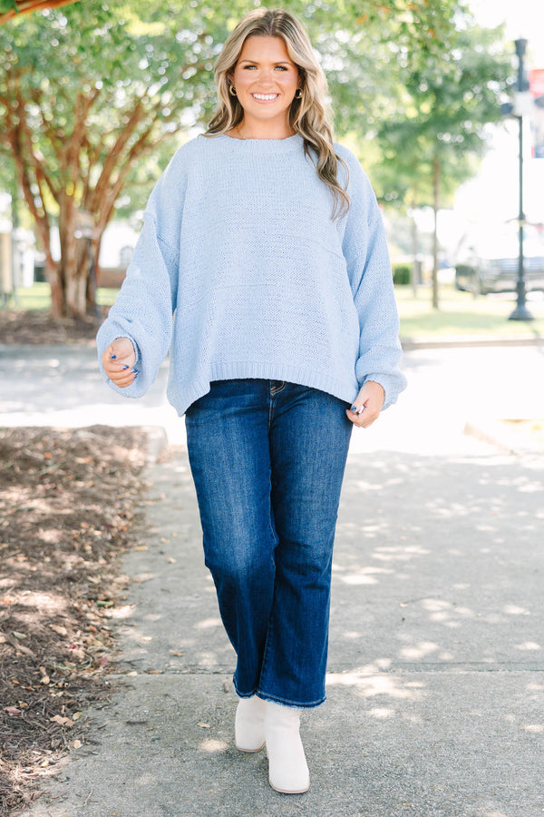 Plus Size light blue oversized knit sweater with a crew neckline and long balloon sleeves.