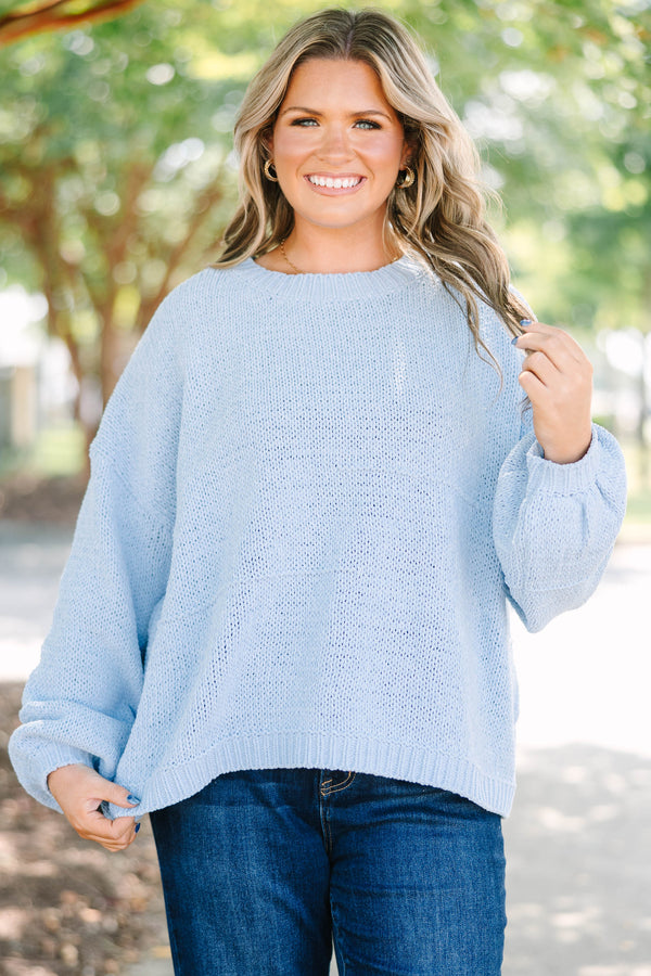 Plus Size light blue oversized knit sweater with a crew neckline and long balloon sleeves.