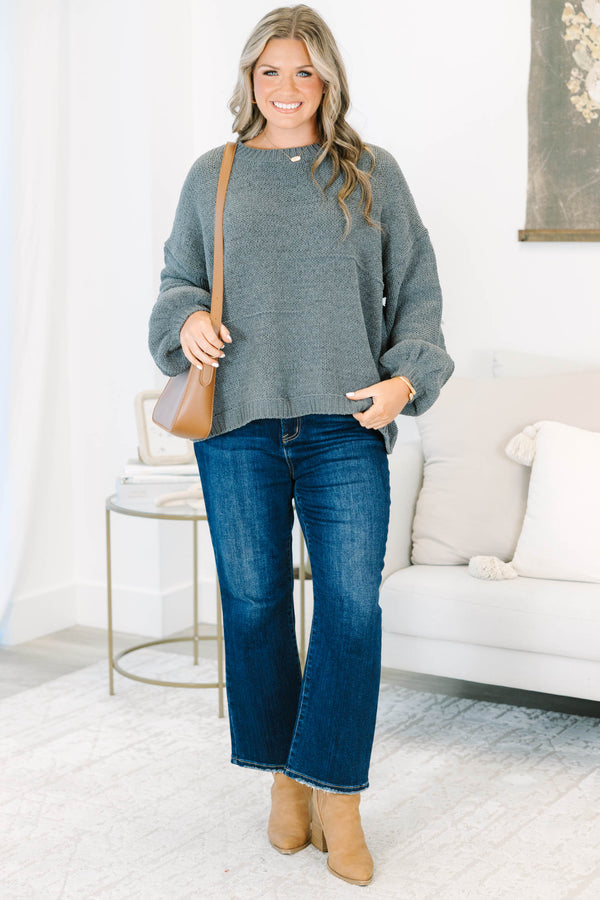 Plus Size charcoal grey oversized knit sweater with a crew neckline and long balloon sleeves.