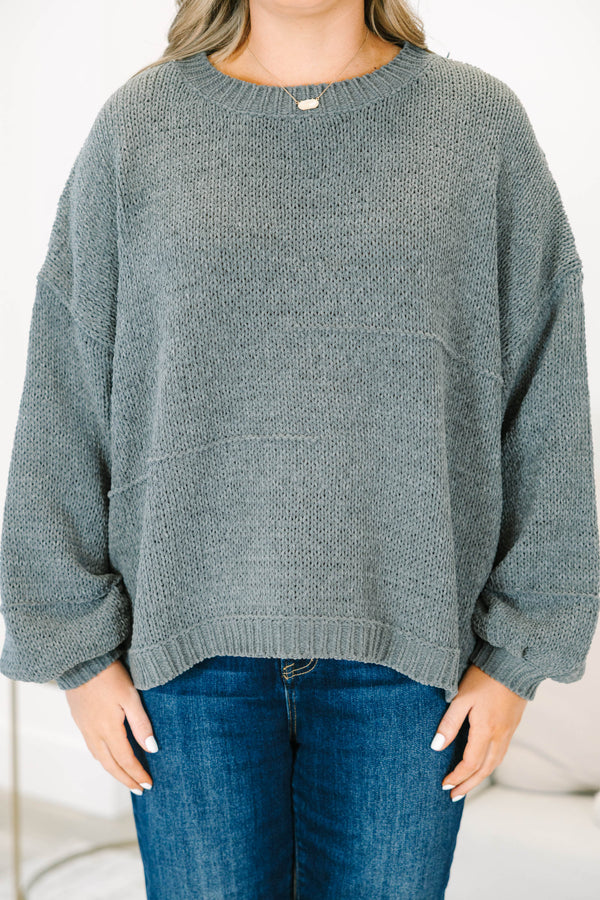 Plus Size charcoal grey oversized knit sweater with a crew neckline and long balloon sleeves.