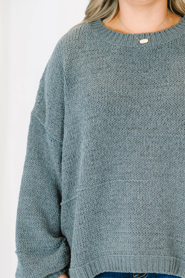 Plus Size charcoal grey oversized knit sweater with a crew neckline and long balloon sleeves.