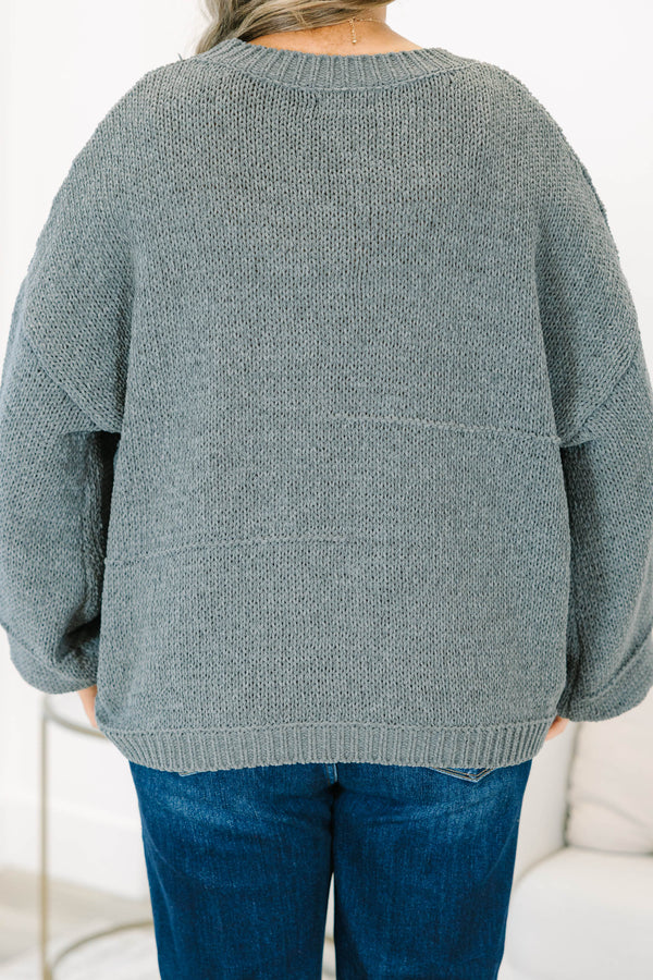 Plus Size charcoal grey oversized knit sweater with a crew neckline and long balloon sleeves.