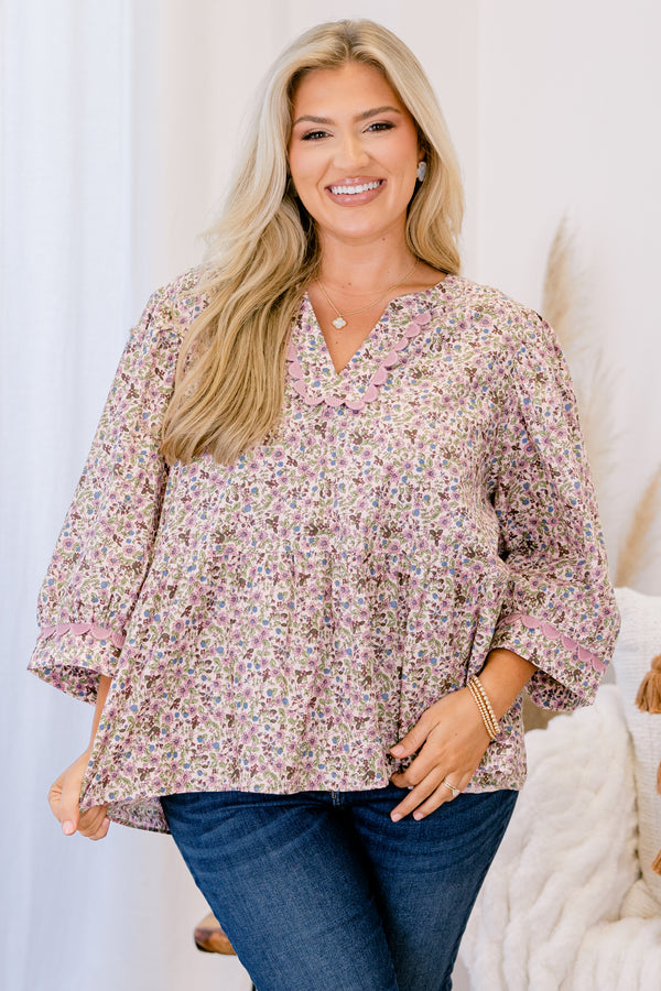 Chic Soul plus size clothing, pink floral top with long sleeves and pink scalloped details around the end of the sleeves and along the v-neckline 