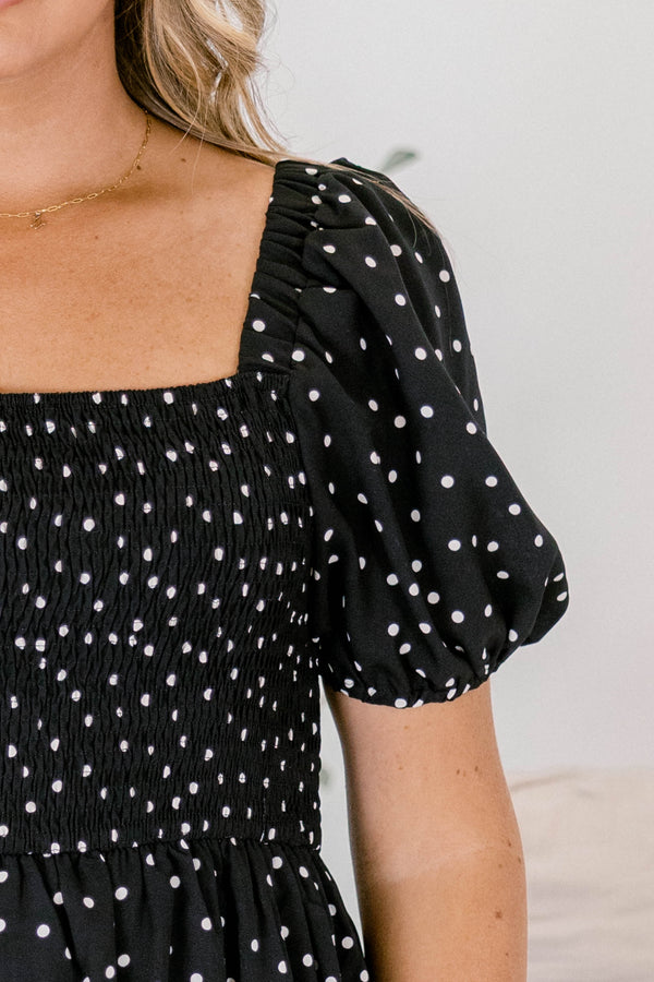 Chic Soul plus size clothing, black polka dot midi dress that has a square neckline and bubble sleeves as well as a ruddle detail on the bottom of the dress 