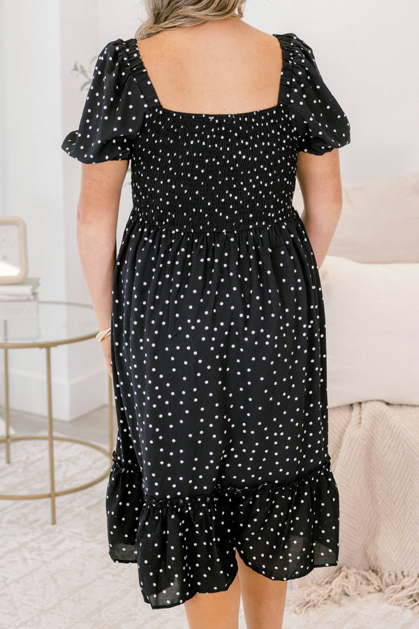 Chic Soul plus size clothing, black polka dot midi dress that has a square neckline and bubble sleeves as well as a ruddle detail on the bottom of the dress 