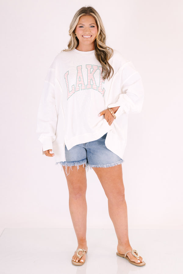 Chic soul plus size clothing, white crewneck sweatshirt with “lake” in block pink and white stripe font
