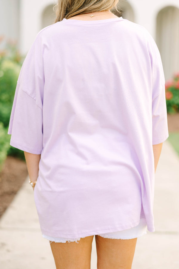 Plus Size lilac oversized boyfriend tee with a green alligator graphic and white denim shorts.