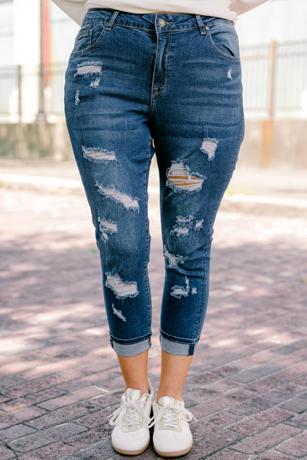 Chic Soul plus size clothing, dark wash jeans with distressed details and cuffs at the end of each pant leg 