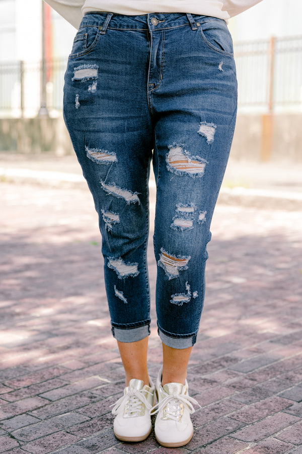 Chic Soul plus size clothing, dark wash jeans with distressed details and cuffs at the end of each pant leg 