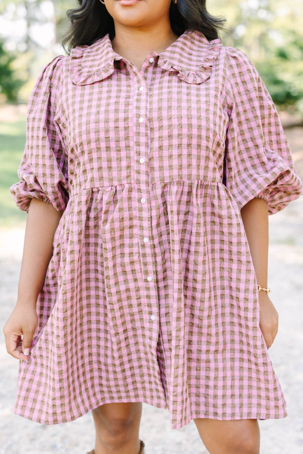 Plus Size mauve and brown gingham babydoll dress with puff sleeves, a collar, and button-down front.