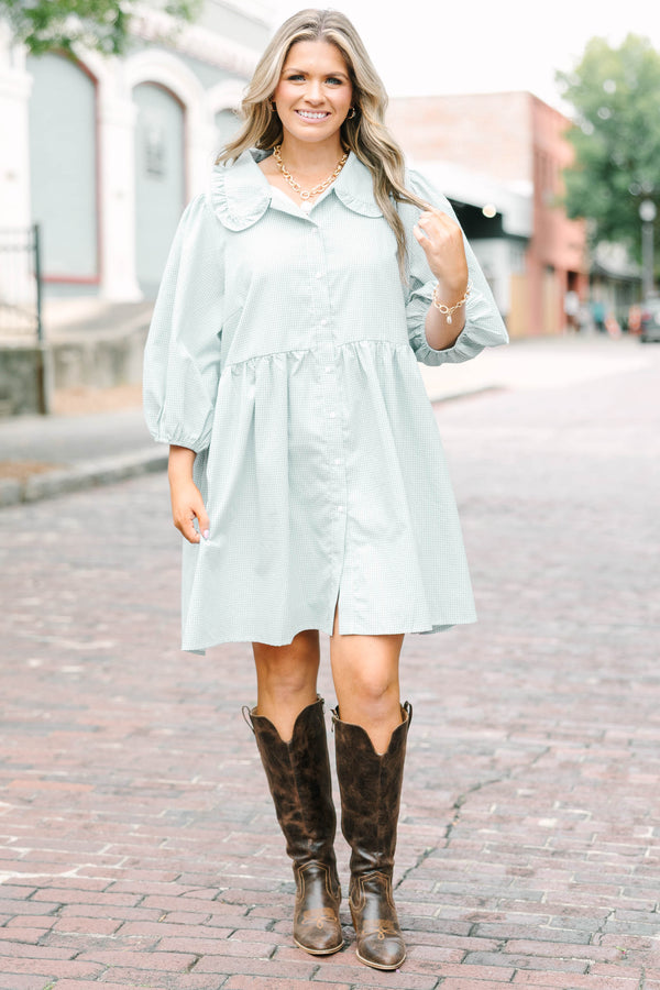 Plus Size green gingham babydoll dress with ruffled Peter Pan collar and puff sleeves.