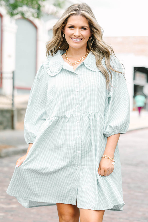 Plus Size green gingham babydoll dress with ruffled Peter Pan collar and puff sleeves.