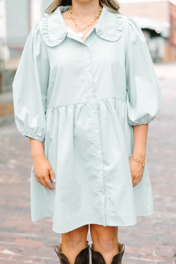Plus Size green gingham babydoll dress with ruffled Peter Pan collar and puff sleeves.