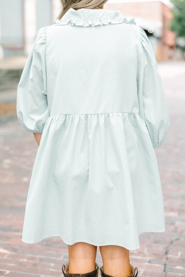 Plus Size green gingham babydoll dress with ruffled Peter Pan collar and puff sleeves.