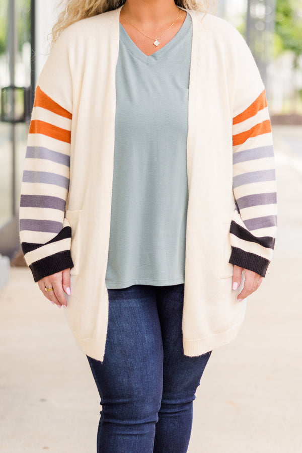 Chic Soul plus size clothing, tan long sleeve cardigan with multi stripe detail along sleeves with pockets on each side