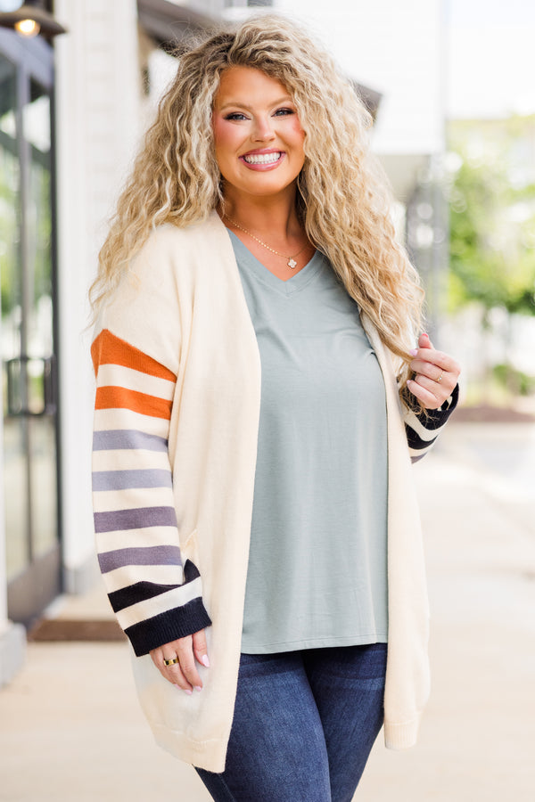 Chic Soul plus size clothing, tan long sleeve cardigan with multi stripe detail along sleeves with pockets on each side