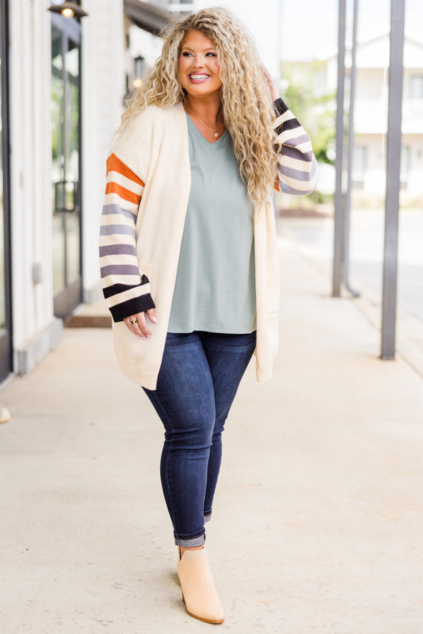 Chic Soul plus size clothing, tan long sleeve cardigan with multi stripe detail along sleeves with pockets on each side