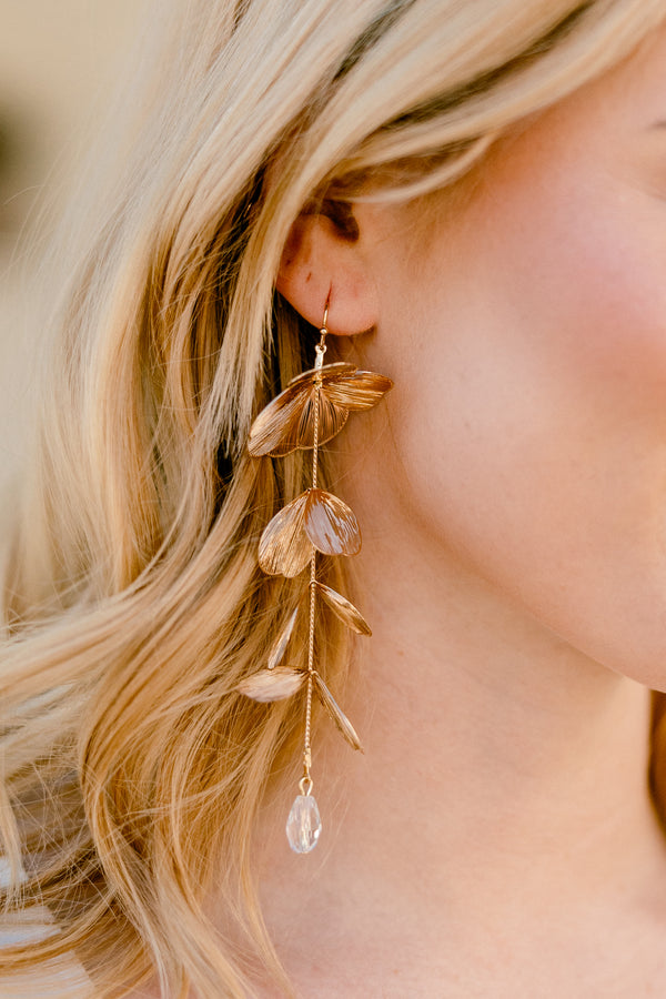 Chic Soul plus size clothing, gold drop dangle earrings with floral petal design with crystal on the bottom  