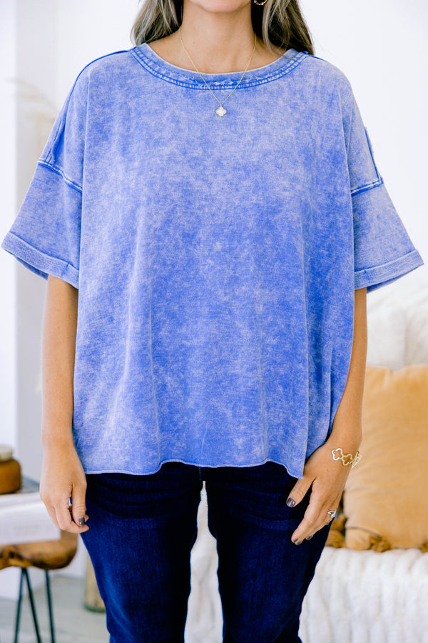 Chic Soul plus size clothing, blue acid wash short sleeve top with cuffs at the ends of each sleeve 