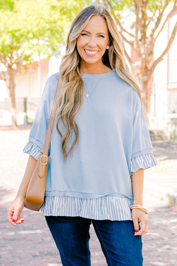 Chic Soul plus size clothing, blue top with half sleeves and a blue striped ruffle detail on the end of the sleeves and bottom of the shirt 