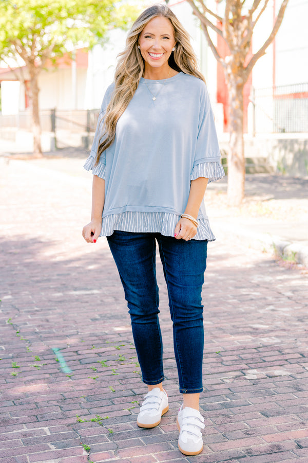Chic Soul plus size clothing, blue top with half sleeves and a blue striped ruffle detail on the end of the sleeves and bottom of the shirt 