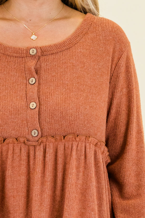 Chic Soul plus size clothing, rust ribbed knit long sleeve knee length dress with round neckline with button up detail with ruffle detail along waist 