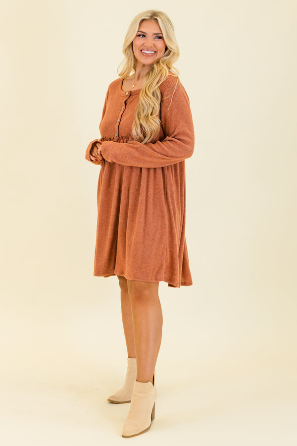 Chic Soul plus size clothing, rust ribbed knit long sleeve knee length dress with round neckline with button up detail with ruffle detail along waist 