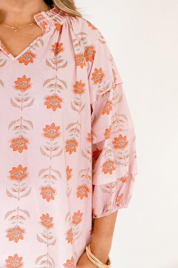 Chic Soul plus size clothing, pink top with half bubble sleeves and a slight v-neckline as well as a pink floral pattern throughout 