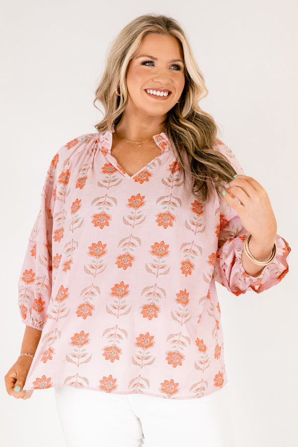 Chic Soul plus size clothing, pink top with half bubble sleeves and a slight v-neckline as well as a pink floral pattern throughout 