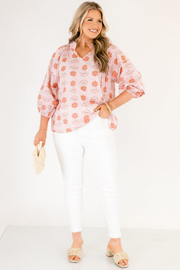 Chic Soul plus size clothing, pink top with half bubble sleeves and a slight v-neckline as well as a pink floral pattern throughout 