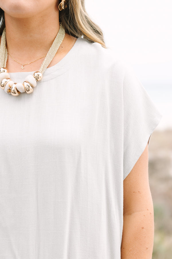 Chic Soul plus size clothing, taupe short sleeve casual top with a thick white ribbed stripe going along the bottom of the top 
