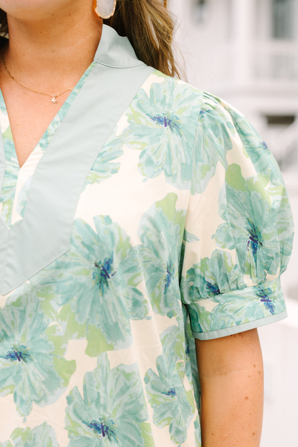 Chic Soul plus size clothing, light green and blue floral print short puff sleeve baby doll dress with v neckline and a solid stripe around the neckline
