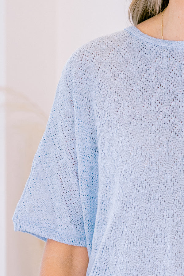 Chic Soul plus size clothing, light blue short sleeve knit top with asymmetric design along the bottom with round neckline