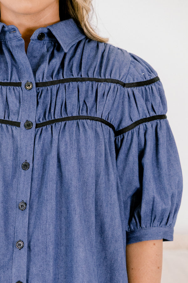 Chic Soul plus size clothing, denim blue mid sleeve button down and collared dress with two black lines acrose the shoulders and chest 