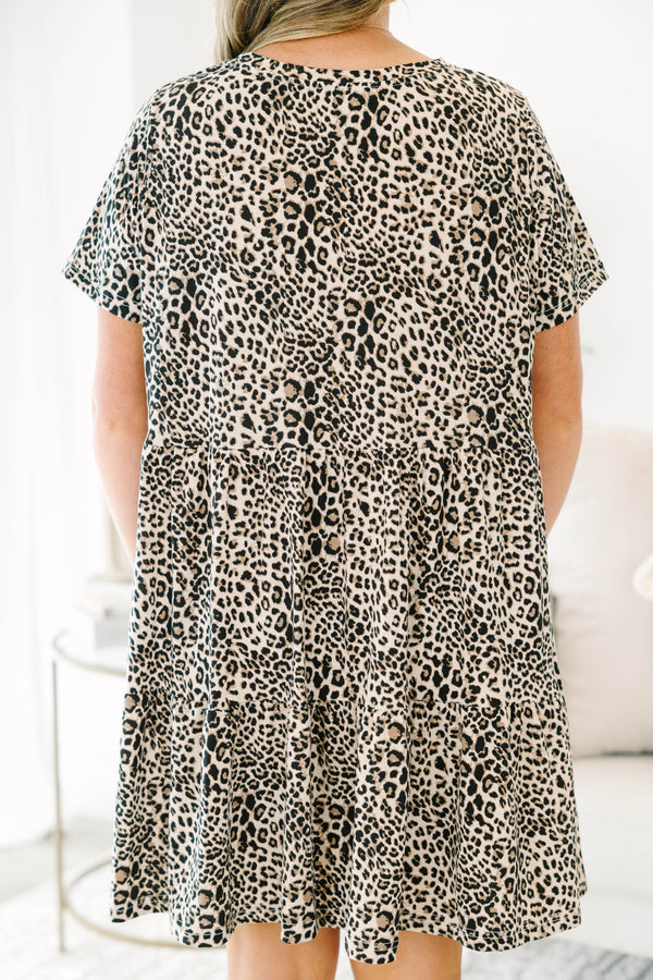 Plus Size leopard print tiered mini dress with short sleeves and a round neckline.